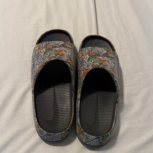 Nike slides size 13. Camo special addition